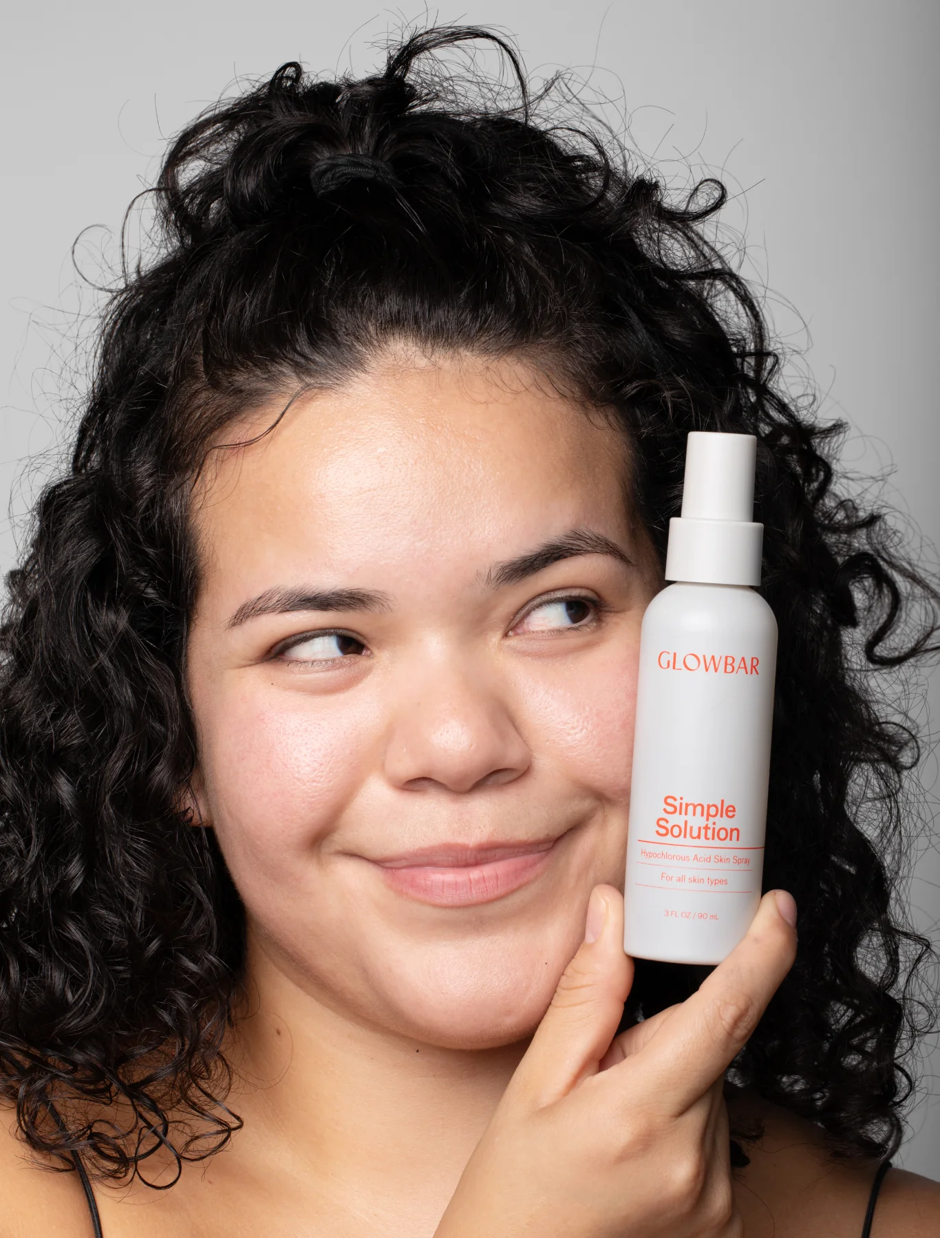 Model using Glowbar Expert Cleanser
